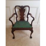 A Good George I Irish Walnut Arm Chair.