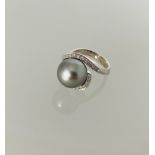 18ct white gold Tahitian black pearl and diamond ring. D 0.23ct. Boxed.