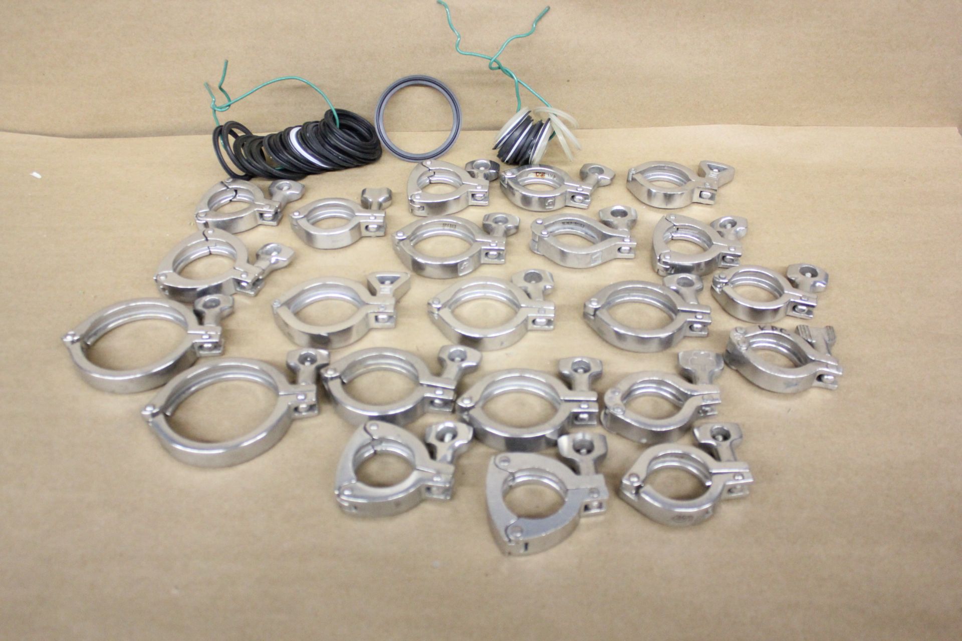 LOT OF LARGE STAINLESS STEEL SANITARY CLAMPS & GASKETS