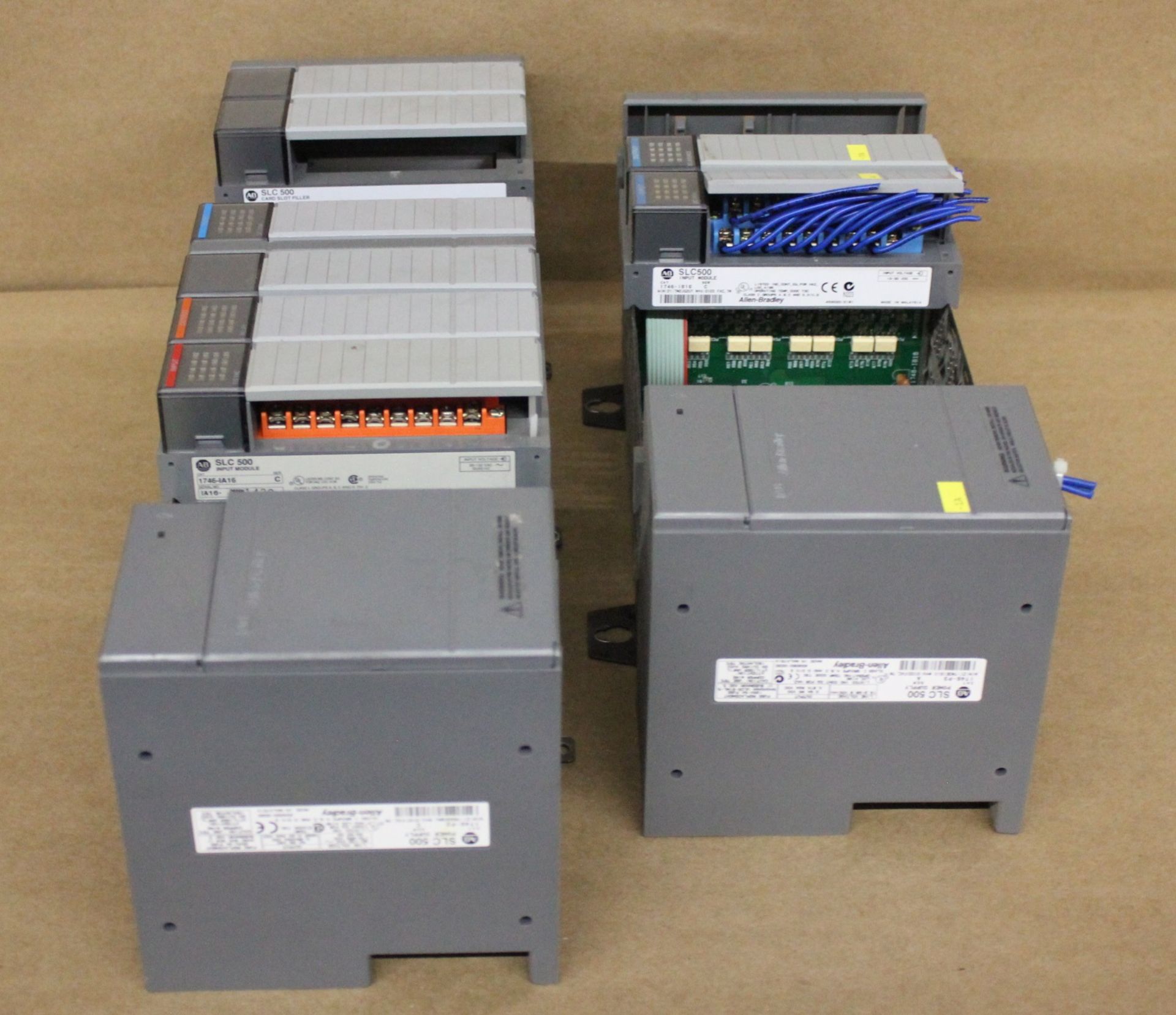 LOT OF ALLEN BRADLEY PLC RACKS WITH POWER AND I/O MODULES