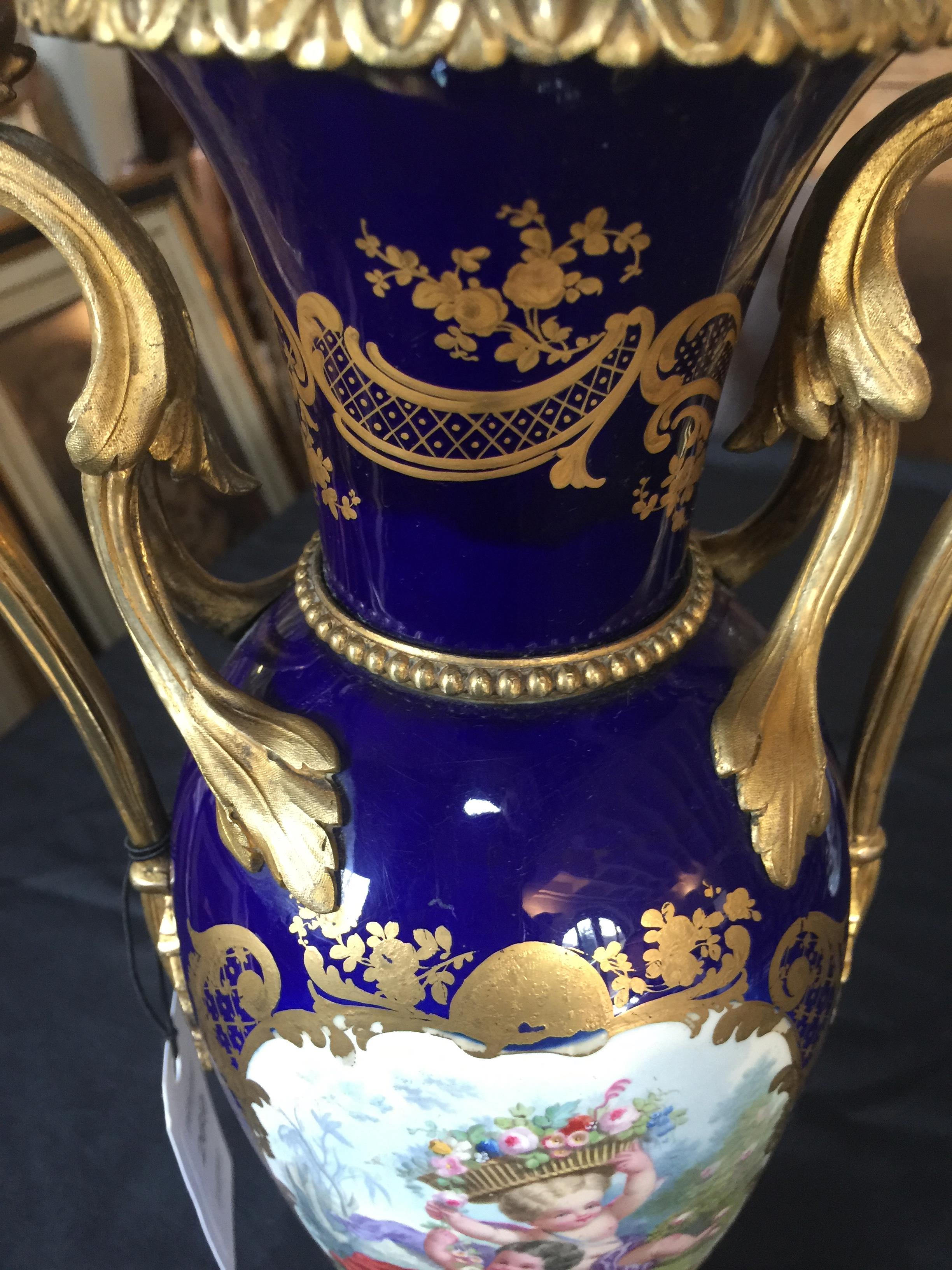 A 19th century Sèvres style blue and gilt painted twin-handled vase - Image 8 of 11