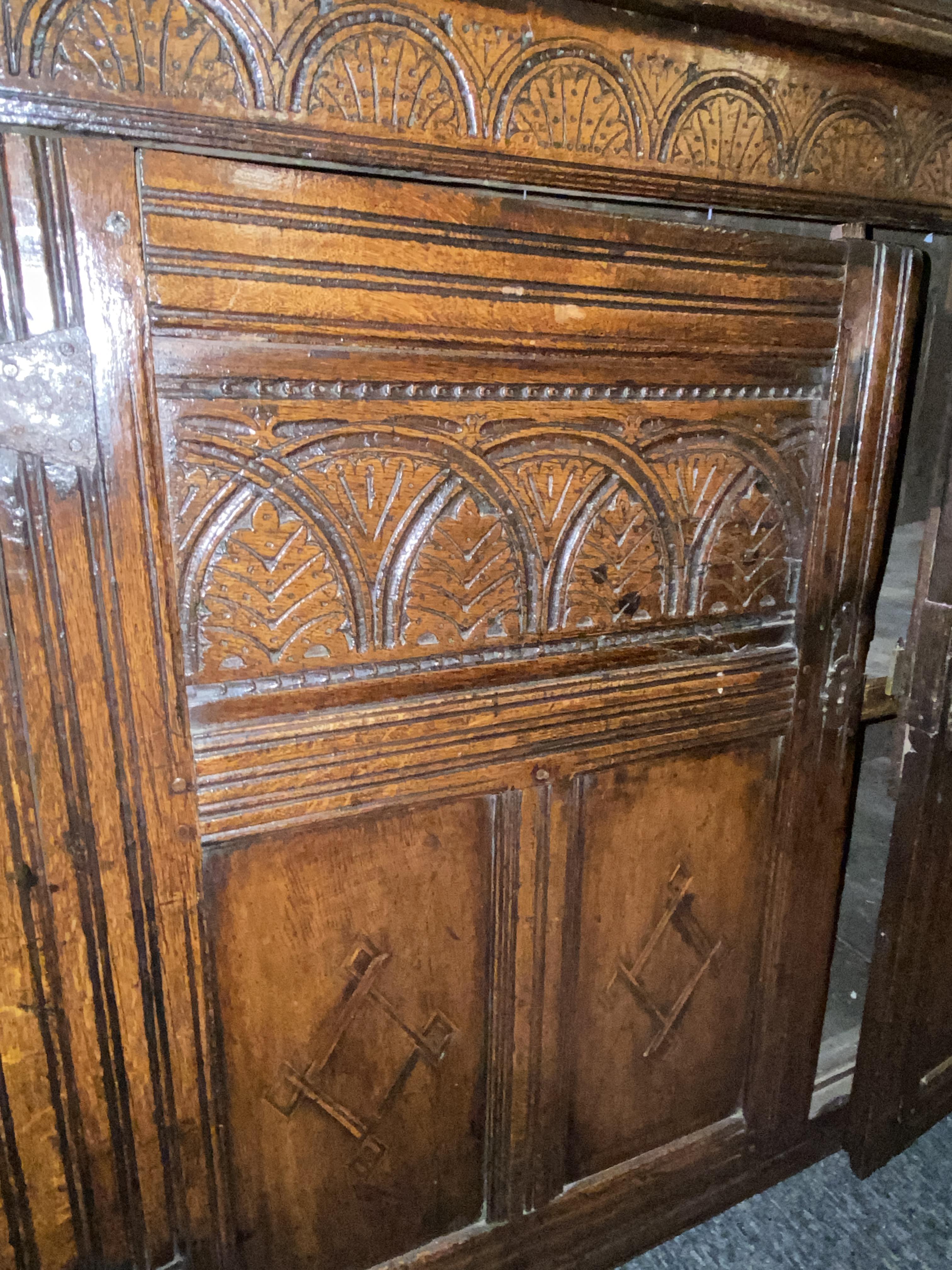 A Charles I carved oak press cupboard - Image 10 of 12