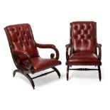 A matched pair of Regency mahogany library open armchairs