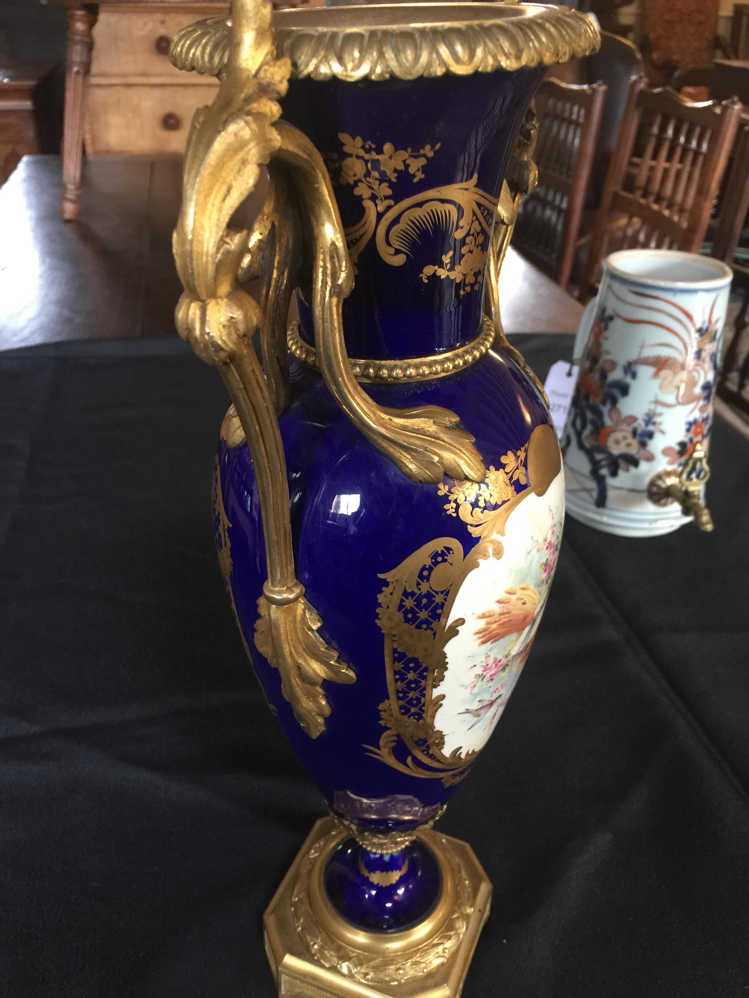 A 19th century Sèvres style blue and gilt painted twin-handled vase - Image 10 of 11