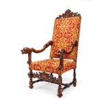 A large mid 19th century Italian walnut high-back armchair