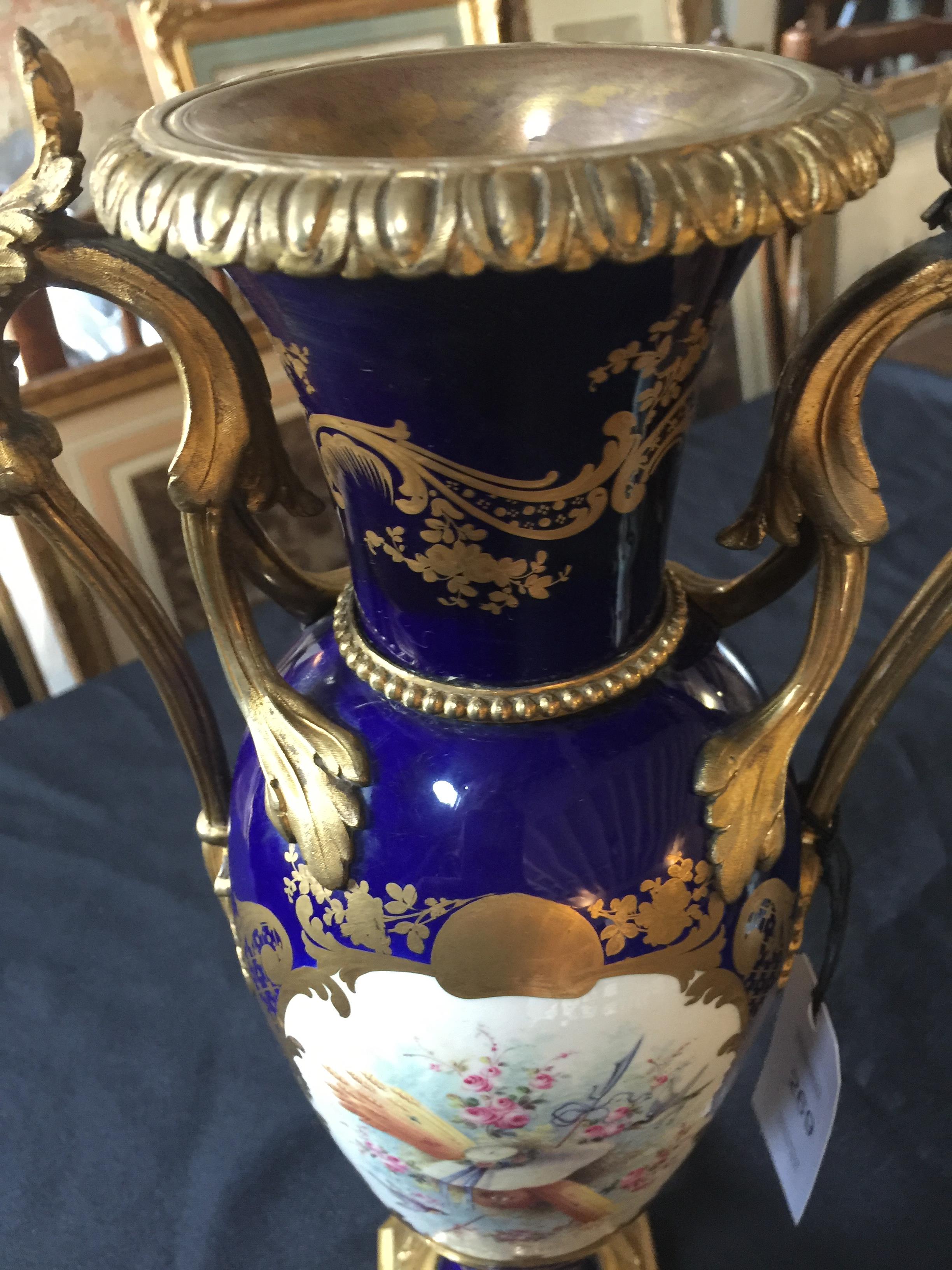 A 19th century Sèvres style blue and gilt painted twin-handled vase - Image 9 of 11
