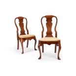 A pair of George I walnut dining chairs