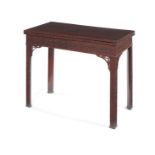 A George III mahogany and crossbanded blind fret carved card table