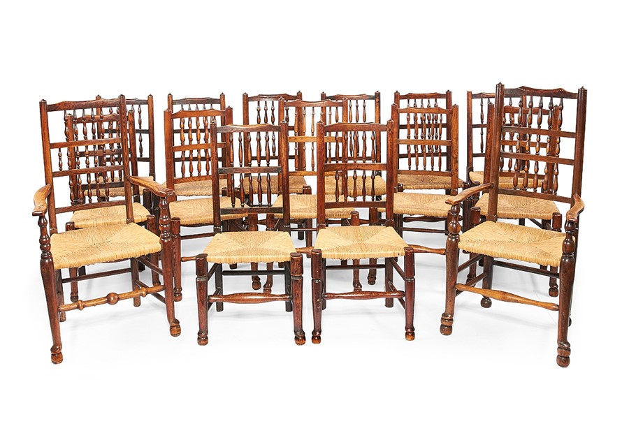 A matched set of sixteen 19th century elm and ash spindle back dining chairs