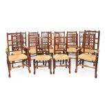 A matched set of sixteen 19th century elm and ash spindle back dining chairs