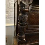 A Charles I carved oak press cupboard