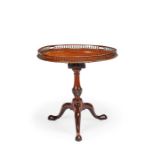 A George III mahogany galleried tripod table