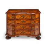 A small 18th century German walnut, ash and marquetry commode