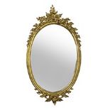 A Napoleon III style oval giltwood mirror