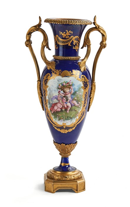 A 19th century Sèvres style blue and gilt painted twin-handled vase