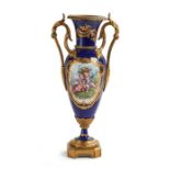 A 19th century Sèvres style blue and gilt painted twin-handled vase