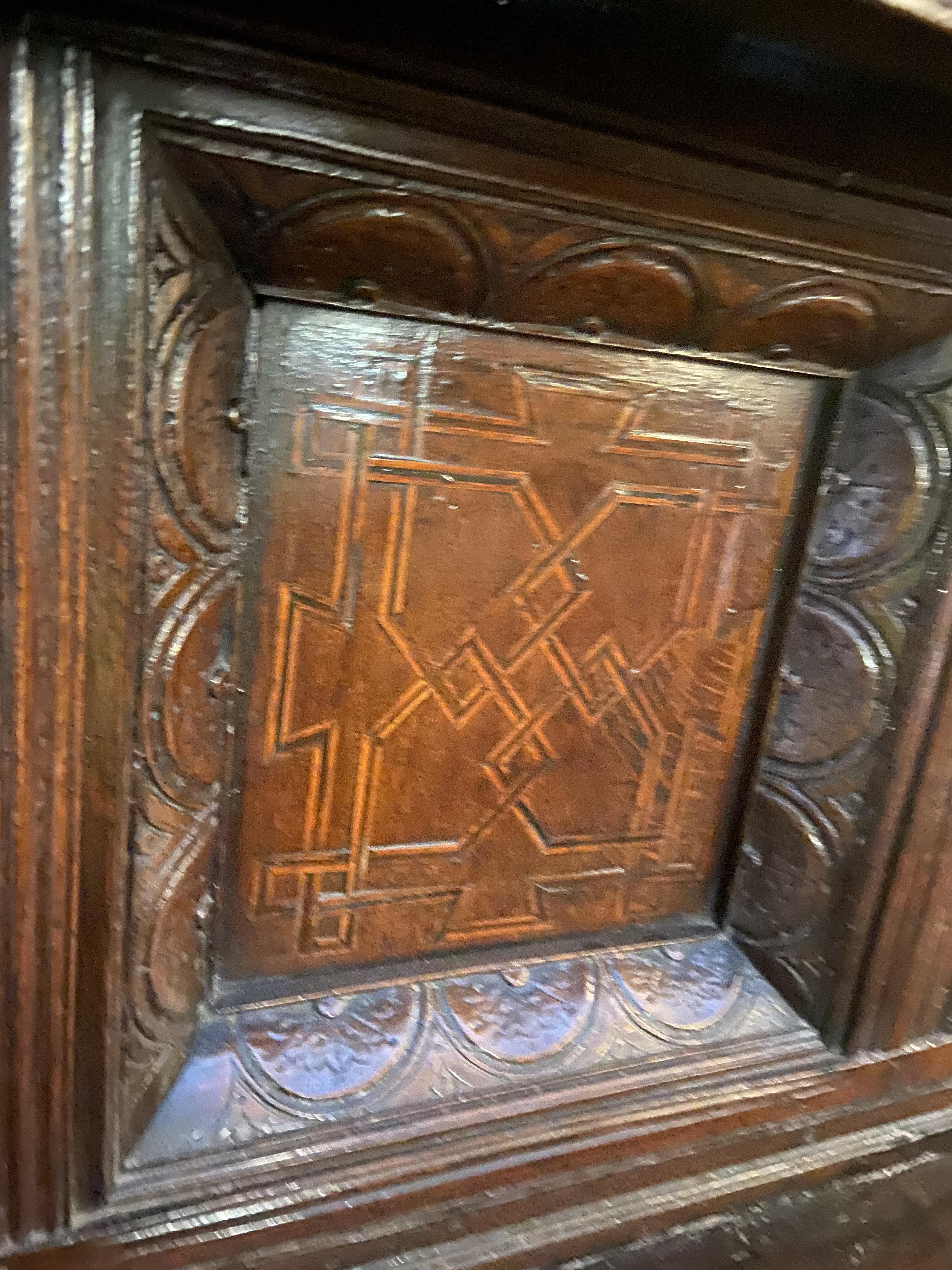 A Charles I carved oak press cupboard - Image 9 of 12