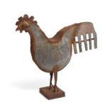 A weathered tin sculpture of a cockerel, mid 20th century