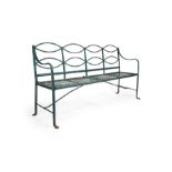 A Regency four seater green painted wrought iron garden seat or bench
