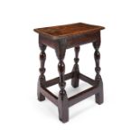 A Charles II oak joined stool