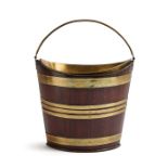A Regency mahogany and brass bound pail