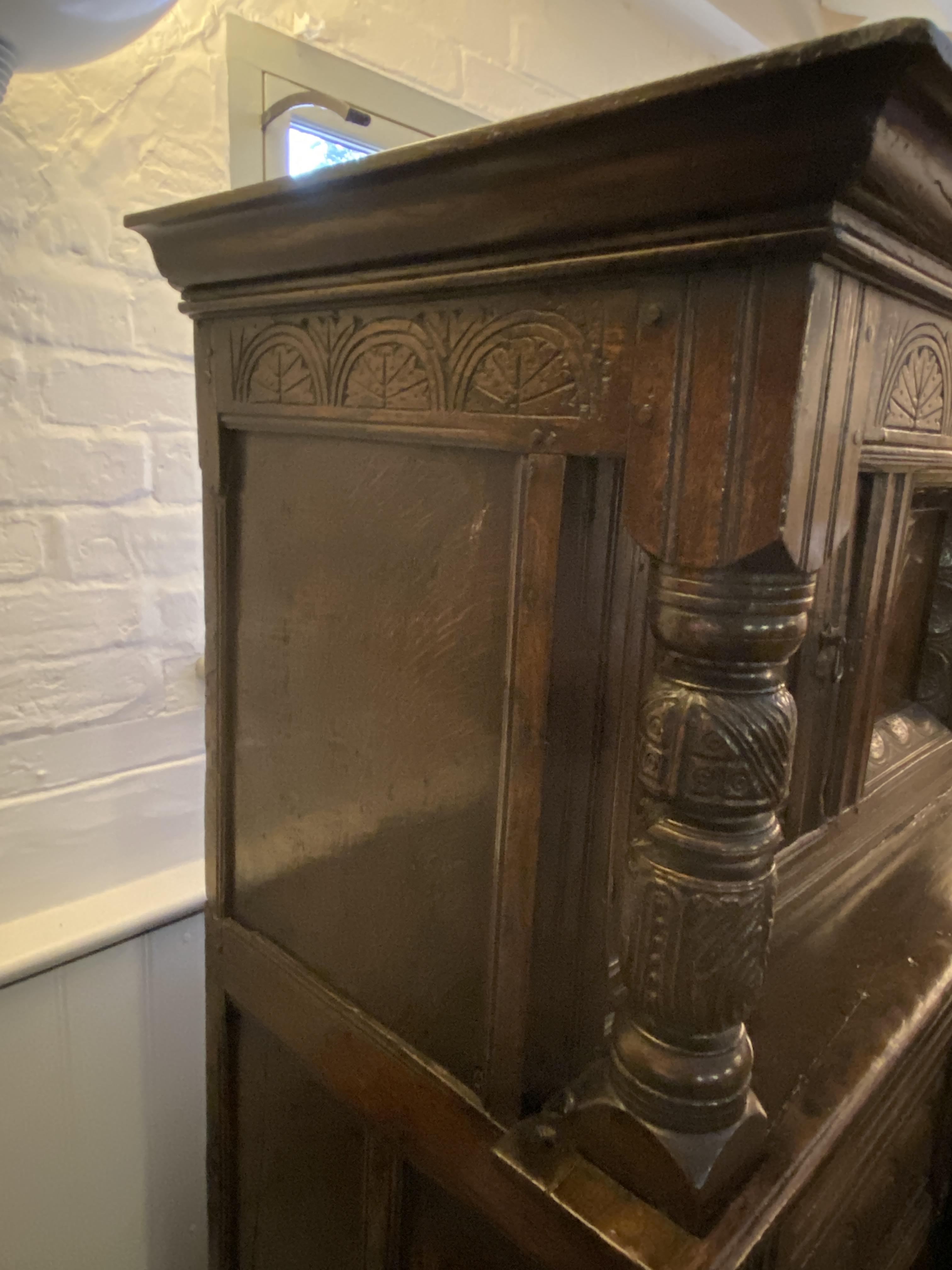 A Charles I carved oak press cupboard - Image 11 of 12