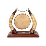 A 19th century cow horn and brass table dinner gong