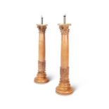A pair of tall late 19th century walnut corinthian column lamp bases
