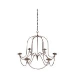 A modern 17th century style wrought iron six light candle chandelier