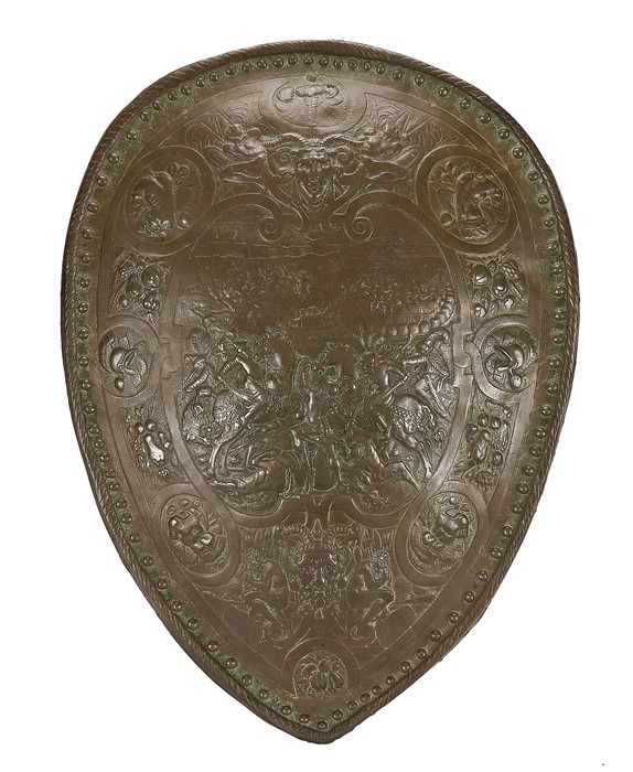 A bronzed plaster decorative shield in the style of Elkington & Co.