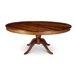 A large circular bespoke 1970's South African stinkwood dining table by Jonker Brothers of Knysna