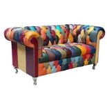 A contemporary 'harlequin' leather chesterfield sofa