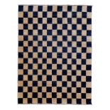 A contemporary chequered carpet