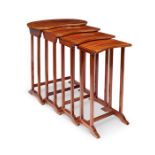 A nest of 20th century mahogany quartetto tables