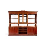 A late 19th century French mahogany and stained pine Baker's shop fitting