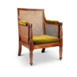 A Regency mahogany bergère chair attributed to Gillows