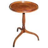 A George III mahogany and tulipwood crossbanded occasional table