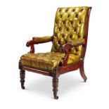 A George IV mahogany green leather patent reclining library armchair by Daws