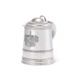 A good George III silver tankard in anachronistic George II style by John Robins,