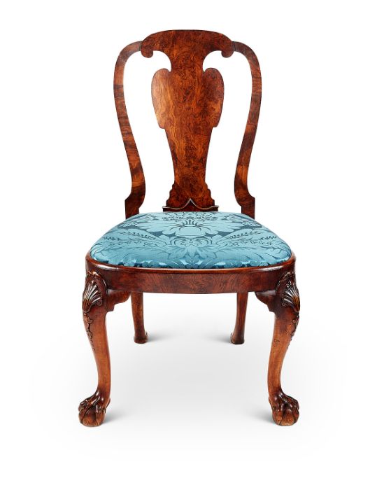 A George II carved walnut side chair in the manner of Giles Grendey