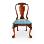 A George II carved walnut side chair in the manner of Giles Grendey