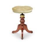 A Regency carved mahogany adjustable piano stool