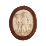A mid 19th century white marble plaque of two young naked boys