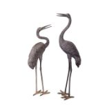 A pair of large 20th century bronze standing garden storks