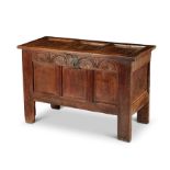 A Charles II oak panelled chest