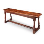 A Charles II elm bench