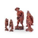 A group of four Japanese boxwood figures