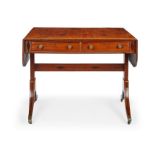 A Regency mahogany and rosewood crossbanded sofa table