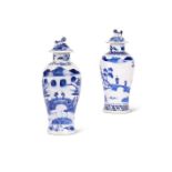 A matched pair of Chinese-Export blue and white baluster vases and covers