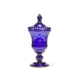 A large late 18th century blue cut-glass goblet and cover